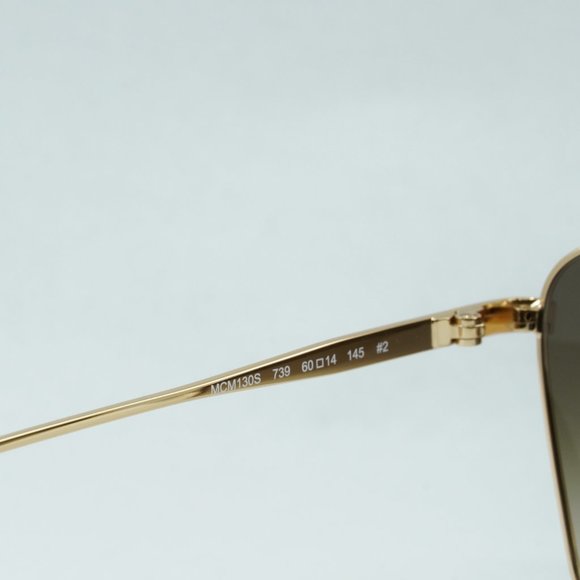 💯 NEW MCM130S 739 SHINY GOLD KHAKI SUNGLASSES - Picture 8 of 14